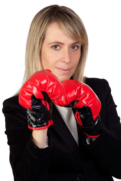 Mujer de negocios desafiante con guantes de boxeo —  Fotos de Stock