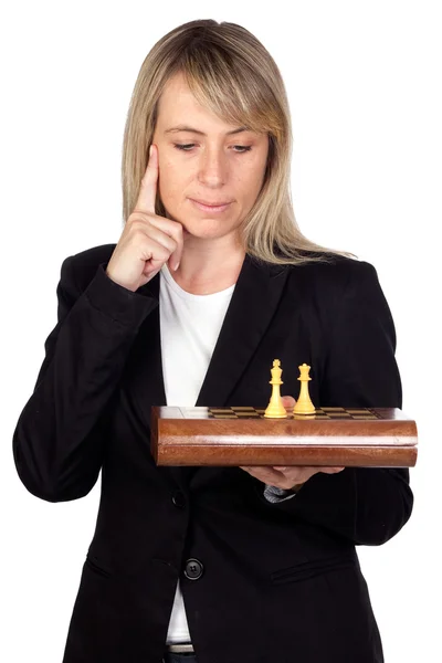 Businesswoman with chessboard — Stock Photo, Image