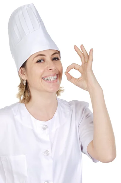 Cocinero mujer llegar a inclinarse los dedos — Foto de Stock