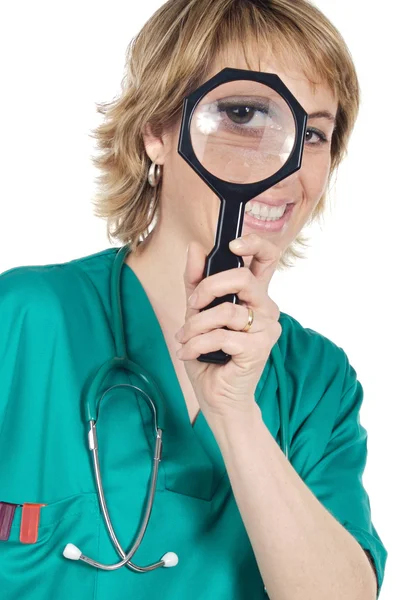 Läkare med förstoringsglas — Stockfoto