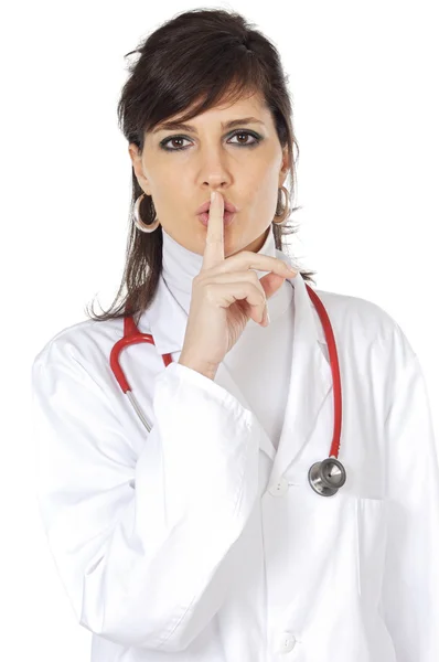 Atraente dama médico ordenando silêncio — Fotografia de Stock