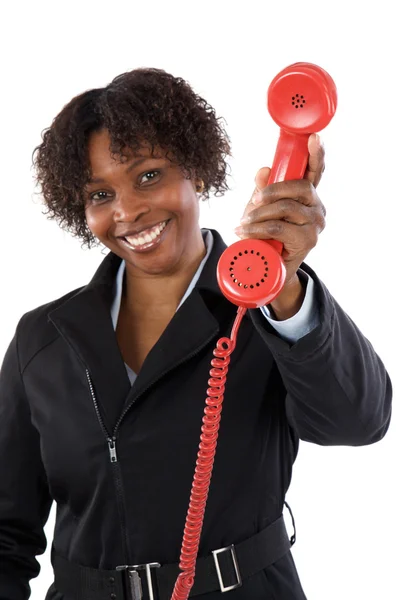 Mulher com um telefone vermelho — Fotografia de Stock