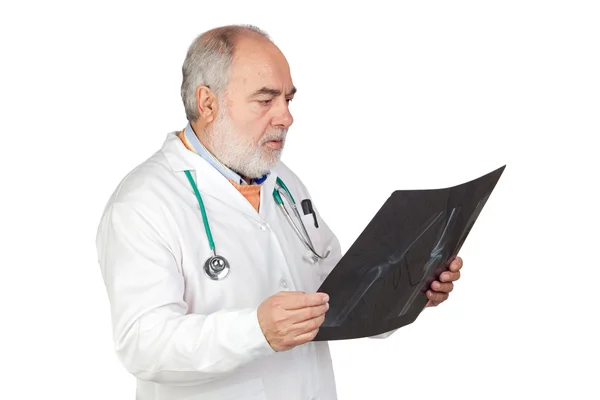 Senior doctor with hoary hair with a radiography — Stock Photo, Image