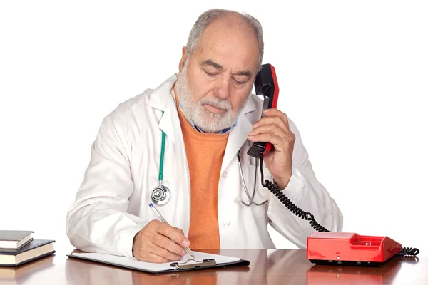 Family doctor talking on the phone — Stock Photo, Image
