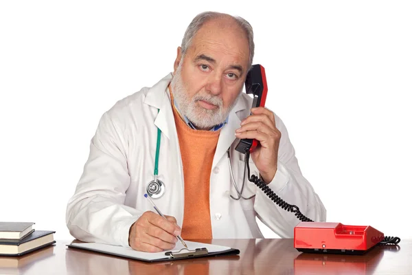 Family doctor talking on the phone — Stock Photo, Image