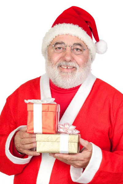 Santa Claus sonriente con dos regalos — Foto de Stock