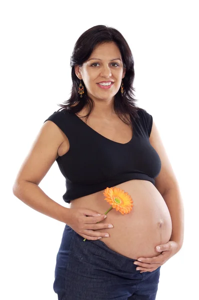 Těhotná s květinou — Stock fotografie