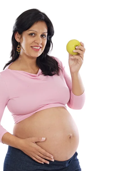 Vackra gravid med ett äpple — Stockfoto