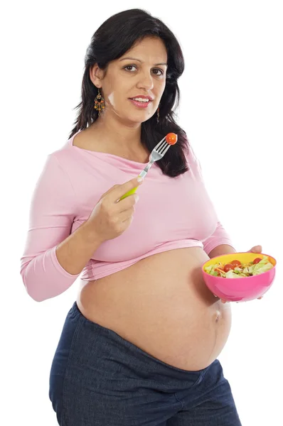 Schöne schwangere essen Salat — Stockfoto