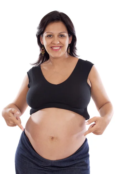 Bella ragazza incinta su uno sfondo bianco bella incinta — Foto Stock