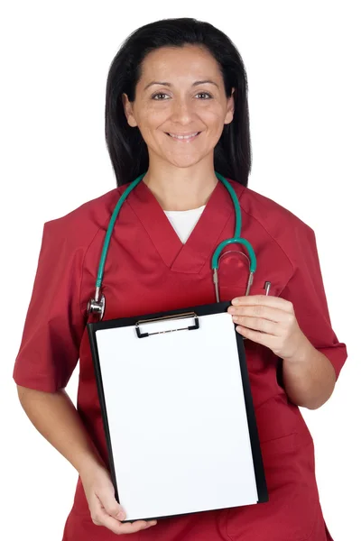 Heureuse femme médecin avec presse-papiers en blanc — Photo