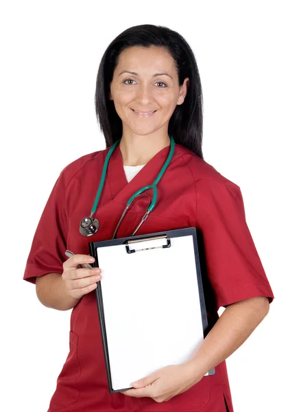 Heureuse femme médecin avec presse-papiers en blanc — Photo