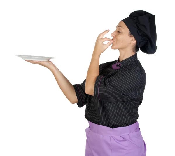 Гарненька кухарка з чорною уніформою — стокове фото
