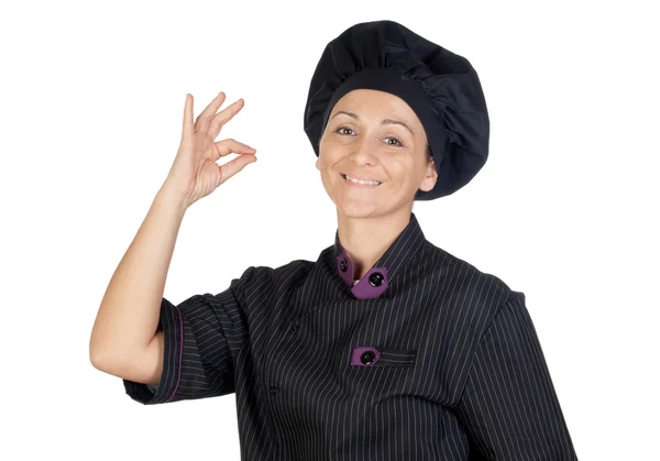 Красивая женщина-повар в черной форме — стоковое фото