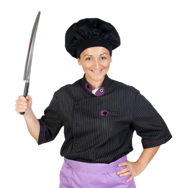 Mulher cozinheira bonita com faca grande — Fotografia de Stock