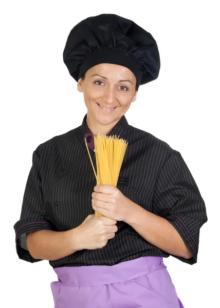 Guapa cocinera con spaguettis — Foto de Stock
