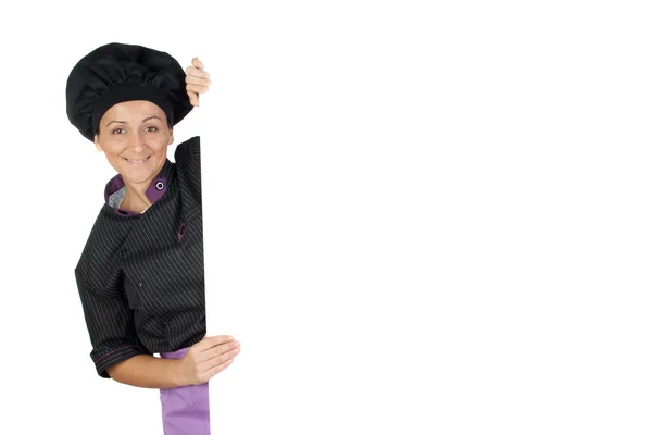 Jolie cuisinière avec une affiche vierge — Photo