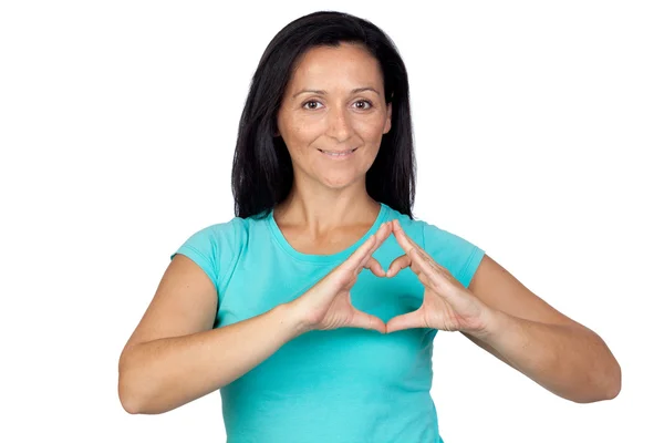 Adorable woman making a heart with the hand — Stock Photo, Image
