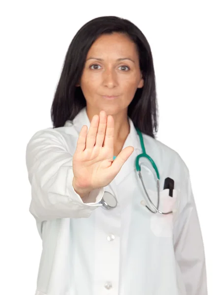 Adorable doctor saying Stop with focus on the hand — Stock Photo, Image