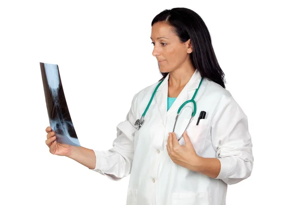 Adorable doctor looking a radiography — Stock Photo, Image