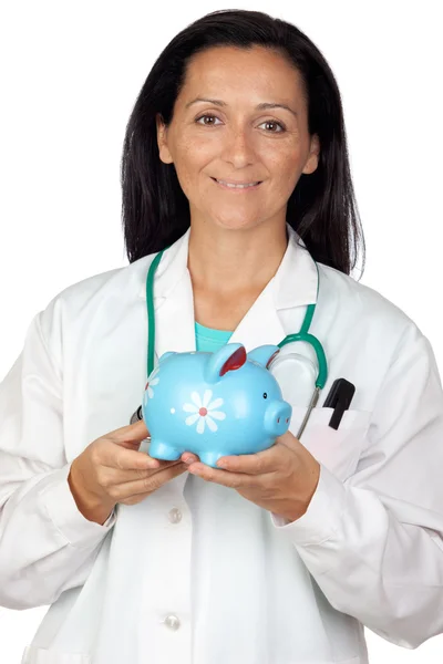 Adorable doctor with money-box — Stock Photo, Image