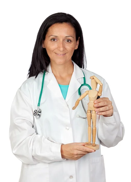 Adorable doctor with a wooden dummy — Stock Photo, Image