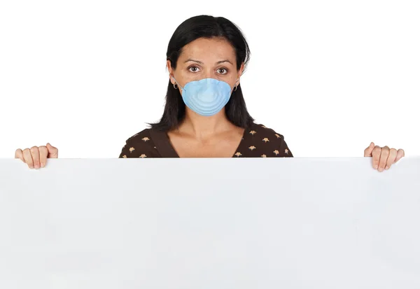 Girl with mask and blank poster — Stock Photo, Image