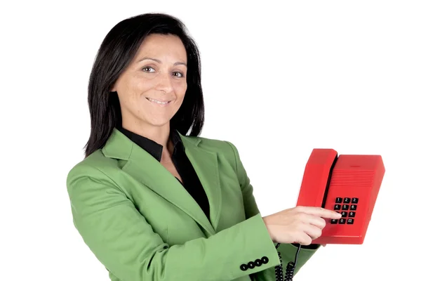 Geschäftsfrau zeigt auf die Tasten am Telefon — Stockfoto