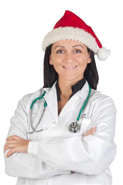 Läkare flicka med med jultomten hatt — Stockfoto