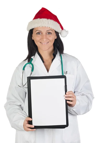 Doctor girl with with Santa Claus hat and clipboard — Stock Photo, Image