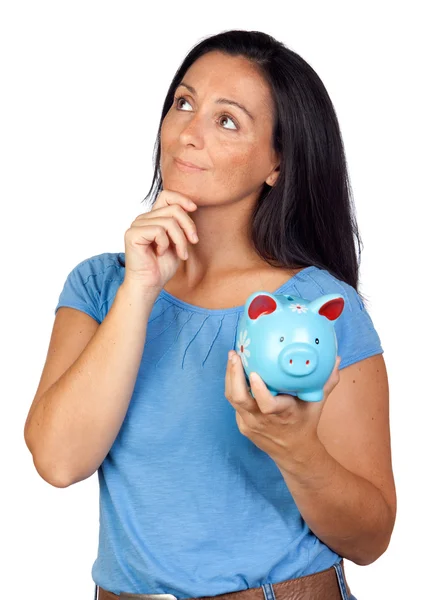 Pensive woman with a blue money-box — Stock Photo, Image