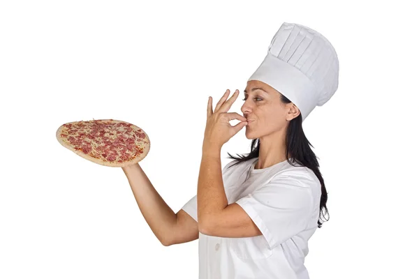 Jolie cuisinière avec une délicieuse pizza — Photo