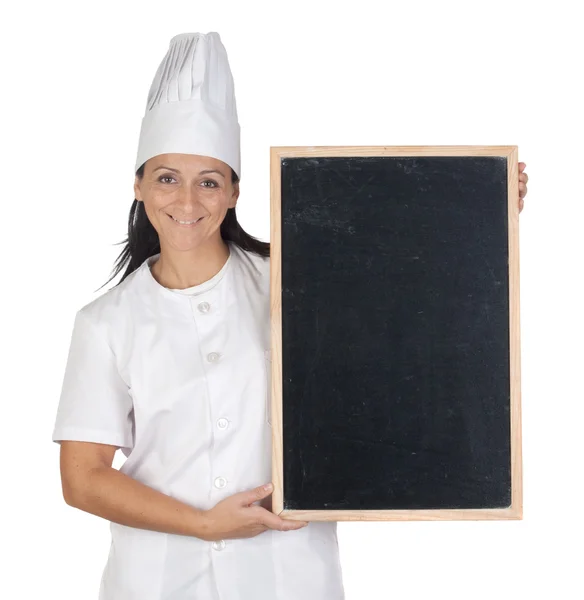 Menina cozinheiro bonita com ardósia em branco — Fotografia de Stock