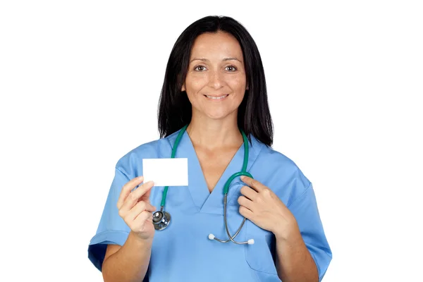 Brunette lääkäri tyhjällä kortilla — kuvapankkivalokuva