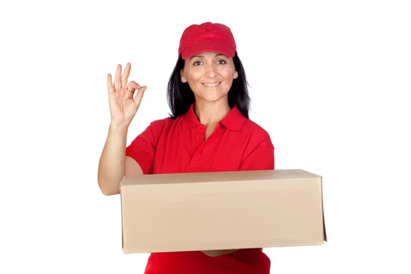 Brunett återförsäljare med röd uniform — Stockfoto