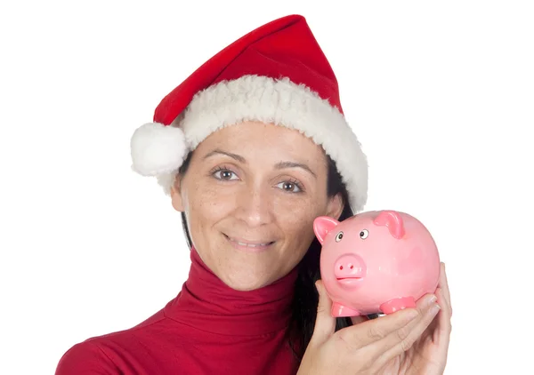 Schönes Mädchen mit Weihnachtsmütze Sparen — Stockfoto