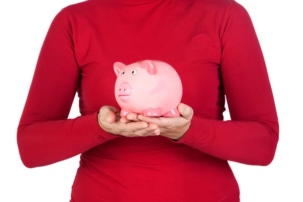 Person in red with a piggy bank on the hands — Stock Photo, Image