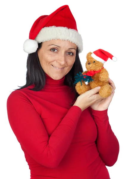 Hermosa chica con un oso de peluche de Navidad — Foto de Stock