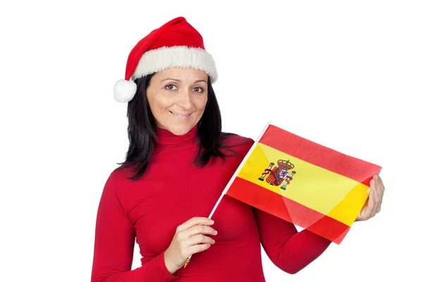 Beautiful girl with Christmas hat and spanish flag — Stock Photo, Image