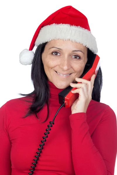 Hermosa chica con sombrero de Navidad al teléfono —  Fotos de Stock