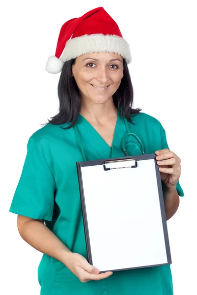크리스마스 모자와 매력적인 의사 여자 — 스톡 사진