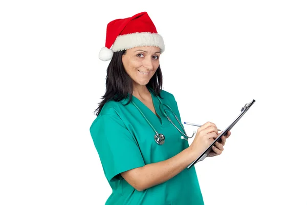 Γιατρός ελκυστική γυναίκα με καπέλο Χριστούγεννα — Φωτογραφία Αρχείου