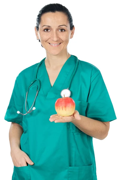 Леди доктор и яблоко — стоковое фото