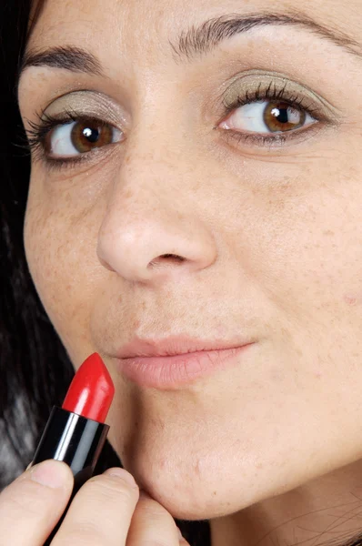 Vrouw met lippenstift — Stockfoto