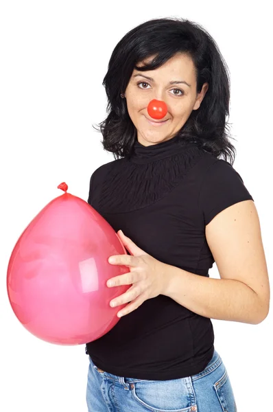 Attraente signora con naso clown e un globo — Foto Stock