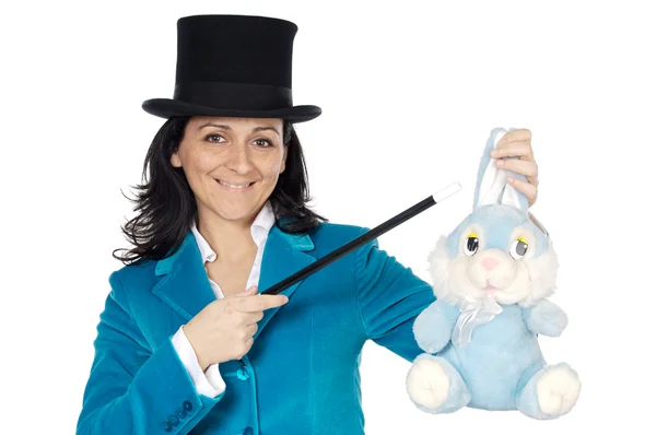 Attractive business woman with a magic wand and hat — Stock Photo, Image
