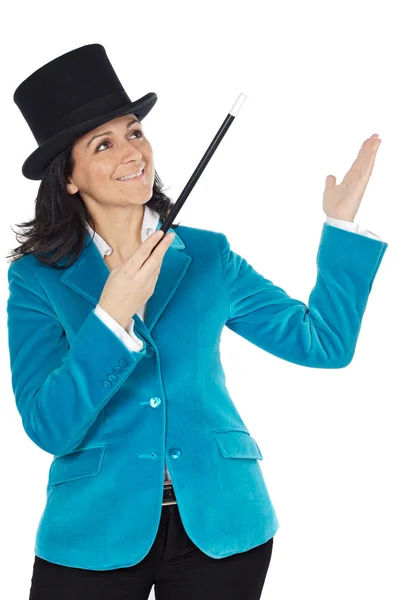 Aantrekkelijke zakenvrouw met een toverstaf en hoed — Stockfoto
