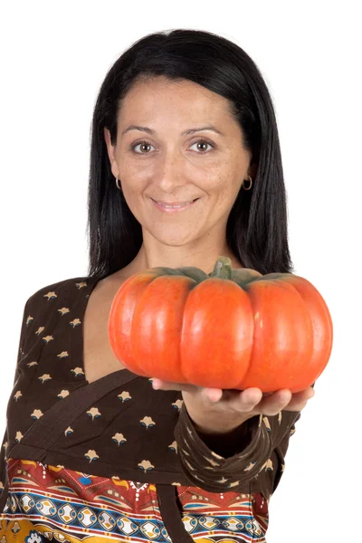 Attractive girl with a big pumpkin — Stock Photo, Image