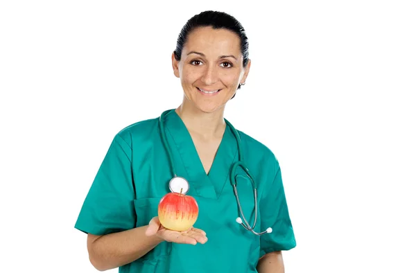 Όμορφη γυναίκα γιατρός με ένα μήλο — Φωτογραφία Αρχείου