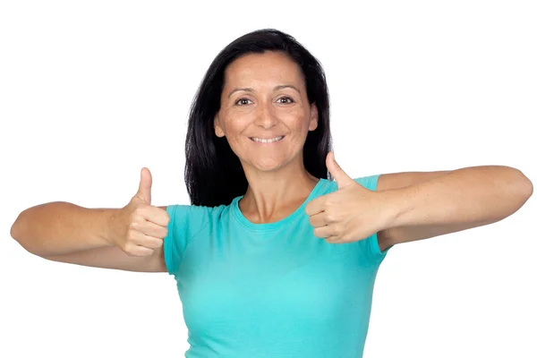 Adorable woman with blue t-shirt saying Ok Stock Picture